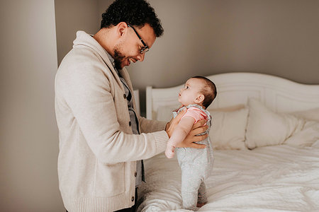 simsearch:614-05955386,k - Father talking face to face with baby daughter Stock Photo - Premium Royalty-Free, Code: 614-09249541