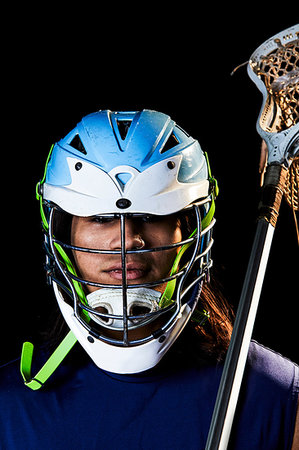 simsearch:614-00893424,k - Portrait of lacrosse player, black background Stock Photo - Premium Royalty-Free, Code: 614-09249765