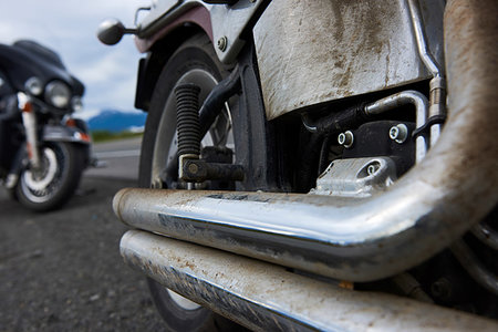 exhaust pipe - Exhaust pipes of motorcycle covered in dirt Stock Photo - Premium Royalty-Free, Code: 614-09258876