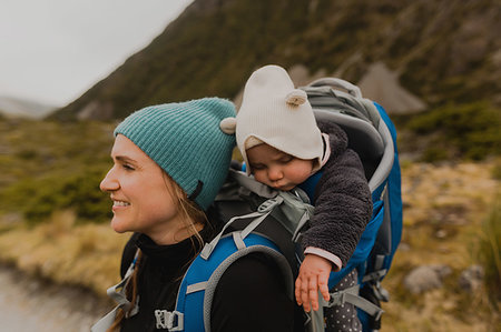 Hiker and baby exploring trail, Wanaka, Taranaki, New Zealand Stock Photo - Premium Royalty-Free, Code: 614-09259228