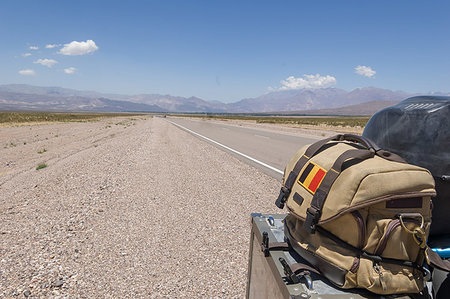 simsearch:614-09259164,k - Landscape with luggage strapped to parked motorbike on roadside, Mendoza, Argentina Photographie de stock - Premium Libres de Droits, Code: 614-09276357