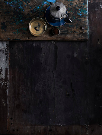 simsearch:614-09276333,k - Rustic low key still life with moka coffee pot and glass of espresso on wooden table, overhead view Photographie de stock - Premium Libres de Droits, Code: 614-09276362