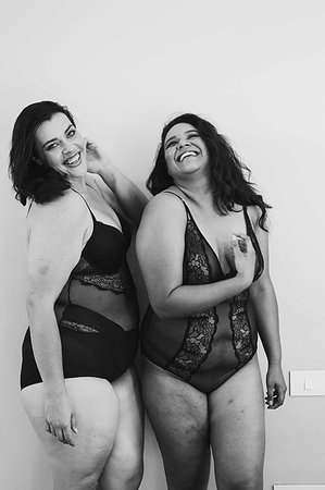 simsearch:693-03315172,k - Friends in lingerie posing indoors against grey background Stock Photo - Premium Royalty-Free, Code: 614-09276535