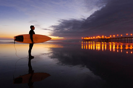 simsearch:614-09127239,k - Surfer, Huntington Beach at sunset, California, USA Stock Photo - Premium Royalty-Free, Code: 614-09277062