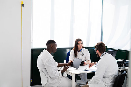 Doctors having discussion in meeting room Stock Photo - Premium Royalty-Free, Code: 614-09270072