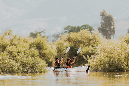 simsearch:614-09078743,k - Friends kayaking in lake, Kaweah, California, United States Stock Photo - Premium Royalty-Free, Code: 614-09270300