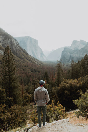 Hiker exploring nature reserve, Yosemite National Park, California, United States Stock Photo - Premium Royalty-Free, Code: 614-09270358