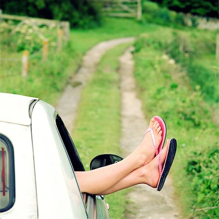 Woman feet in flip flop Stock Photos - Page 1 : Masterfile