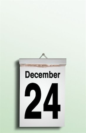 Christmas Eve date on calendar Stock Photo - Premium Royalty-Free, Code: 614-00379419
