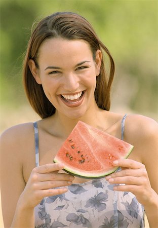 Woman with melon Stock Photo - Premium Royalty-Free, Code: 614-00385225