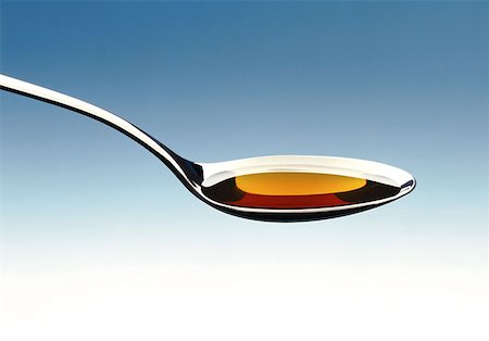 simsearch:614-00397700,k - Cough medicine on a spoon Foto de stock - Sin royalties Premium, Código: 614-00387696