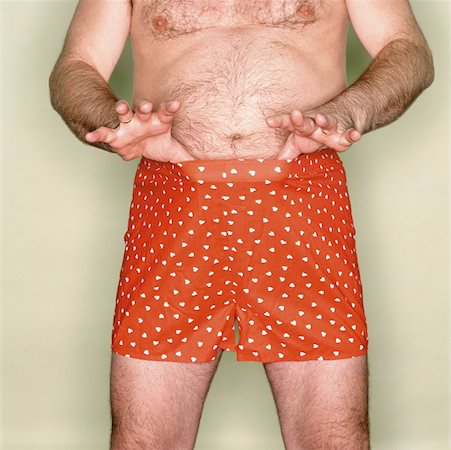 Guy in boxer shorts Stock Photos - Page 1 : Masterfile