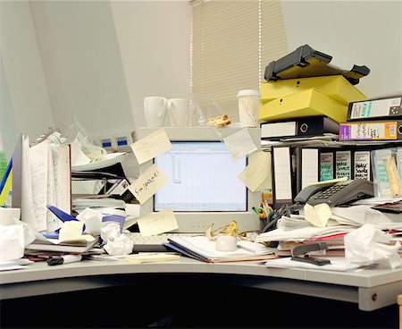 Messy office desk Stock Photo - Premium Royalty-Free, Code: 614-00594234