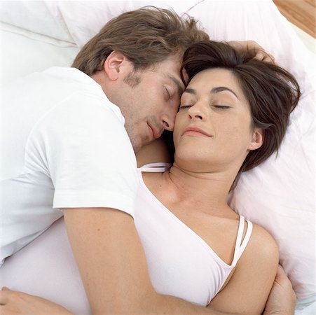 simsearch:614-00599224,k - Close couple asleep in bed Stock Photo - Premium Royalty-Free, Code: 614-00594448