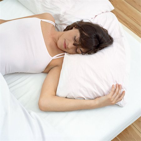 simsearch:614-00599224,k - Woman asleep in bed Stock Photo - Premium Royalty-Free, Code: 614-00594451
