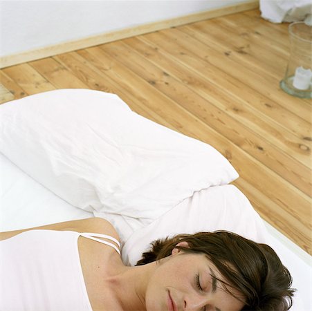 simsearch:614-00599224,k - Woman asleep in bed Stock Photo - Premium Royalty-Free, Code: 614-00594452