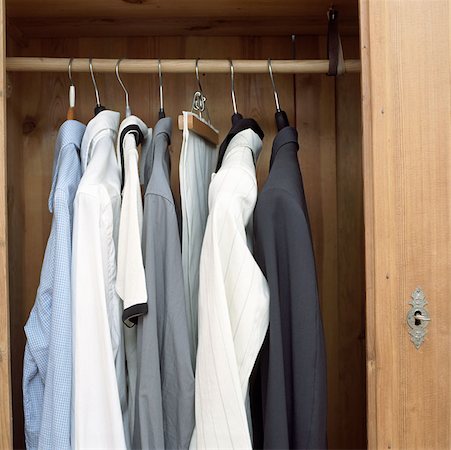 shirt on hanger - Cupboard with male shirts Stock Photo - Premium Royalty-Free, Code: 614-00594501