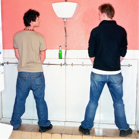 Boys urinating Stock Photo - Premium Royalty-Free, Code: 614-00597881