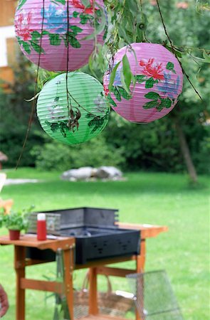 decoration barbecue party - Paper lampshades at barbeque Stock Photo - Premium Royalty-Free, Code: 614-00599400