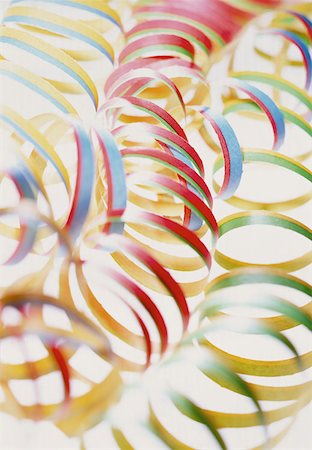 party streamers on white background - Party streamers Stock Photo - Premium Royalty-Free, Code: 614-00593609