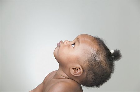 pictures of baby face side profile - Profile of a baby girl Stock Photo - Premium Royalty-Free, Code: 614-00654515
