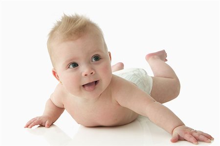 Baby sticking out her tongue Stock Photo - Premium Royalty-Free, Code: 614-00654842