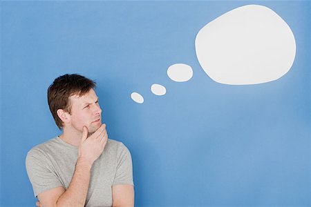 speech bubble with someone thinking - Man with thought bubble Stock Photo - Premium Royalty-Free, Code: 614-00658093