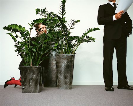 Funny office spy Stock Photos - Page 1 : Masterfile