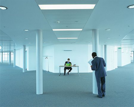 simsearch:614-00651999,k - Businessmen in empty office Stock Photo - Premium Royalty-Free, Code: 614-00651956