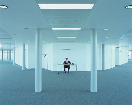 simsearch:614-00651999,k - Businessman in an empty office Stock Photo - Premium Royalty-Free, Code: 614-00652011