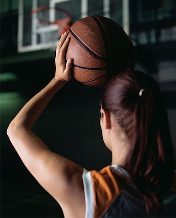 Female basketball player Stock Photo - Premium Royalty-Free, Code: 614-00652779