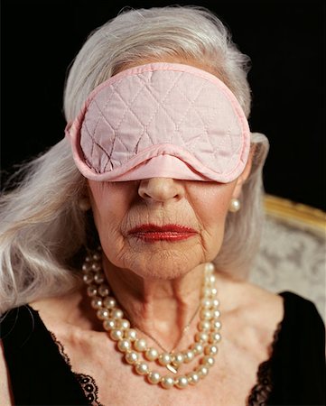 simsearch:614-00653631,k - Senior adult woman wearing pink eye mask Stock Photo - Premium Royalty-Free, Code: 614-00653587