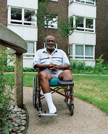 senior wheelchair outside - Man in wheelchair in garden Stock Photo - Premium Royalty-Free, Code: 614-00653690