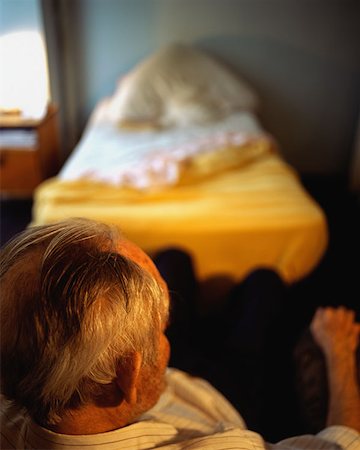 Elderly man in his room Stock Photo - Premium Royalty-Free, Code: 614-00653700