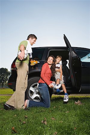 soccer ball sneaker - Family getting out of car Stock Photo - Premium Royalty-Free, Code: 614-00808297