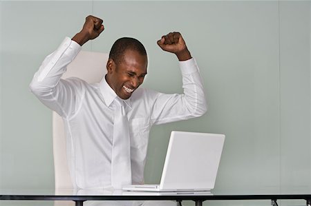 relieved excited person - Overjoyed businessman Stock Photo - Premium Royalty-Free, Code: 614-00844252