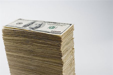 simsearch:614-02934764,k - Stack of hundred dollar bills Foto de stock - Royalty Free Premium, Número: 614-00843817