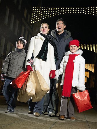 Family out christmas shopping Stock Photo - Premium Royalty-Free, Code: 614-00892921