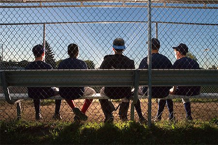 picture of bench at baseball game - Five teenagers watching from the sidelines Stock Photo - Premium Royalty-Free, Code: 614-00893806