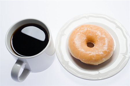 simsearch:614-03191356,k - Coffee and a doughnut Stock Photo - Premium Royalty-Free, Code: 614-00912949