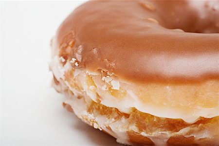 simsearch:614-03191356,k - Chocolate glazed doughnut Stock Photo - Premium Royalty-Free, Code: 614-00913150