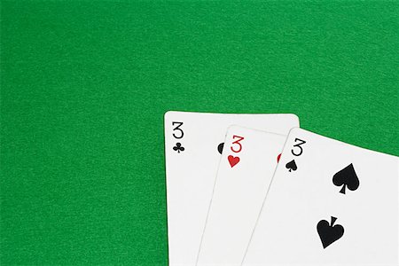 playing poker - Playing cards Stock Photo - Premium Royalty-Free, Code: 614-00943439