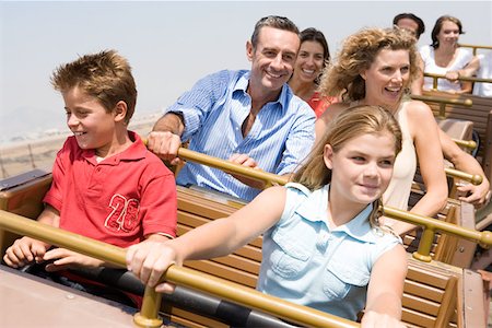 Family on a rollercoaster Stock Photo - Premium Royalty-Free, Code: 614-00967835