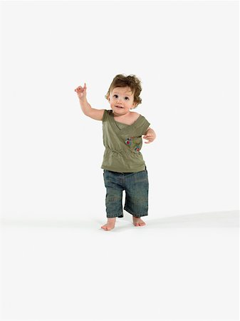 finger pointing up - Toddler walking Stock Photo - Premium Royalty-Free, Code: 614-01028678