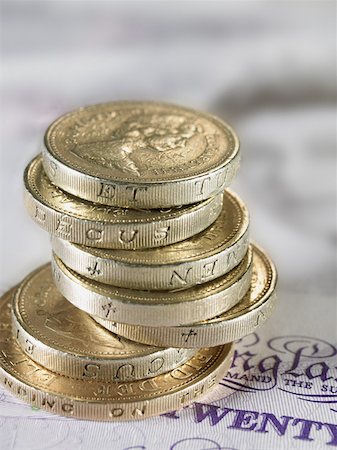 piles of cash pounds - Monnaie britannique Photographie de stock - Premium Libres de Droits, Code: 614-01087120