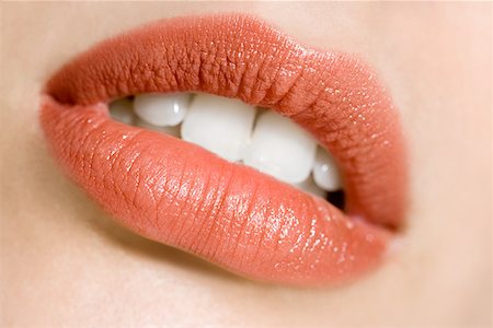 perfect white teeth - Wearing lipstick Stock Photo - Premium Royalty-Free, Code: 614-01088588
