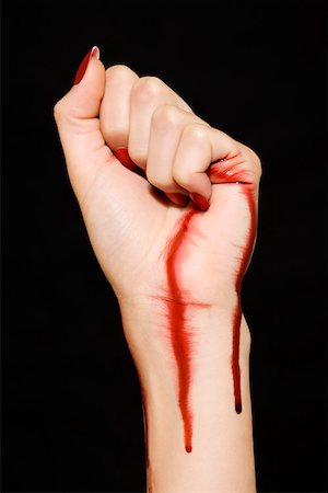 Femme avec du sang sur sa main et le poignet Photographie de stock - Premium Libres de Droits, Code: 614-01088617
