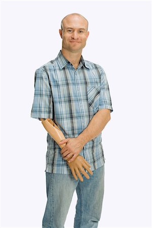 Portrait of a man with an artificial arm Stock Photo - Premium Royalty-Free, Code: 614-01179937