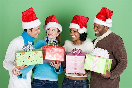 Group of friends with presents Stock Photo - Premium Royalty-Free, Code: 614-01170109