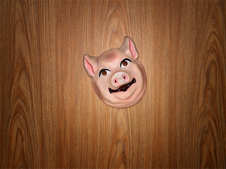 Pig mask Stock Photo - Premium Royalty-Free, Code: 614-01170929